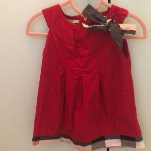 Adorable red dress with plaid trimming